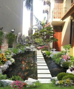 Hòn non bộ đẹp với bể cá và cây cảnh